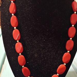 Women's red necklace with an extender